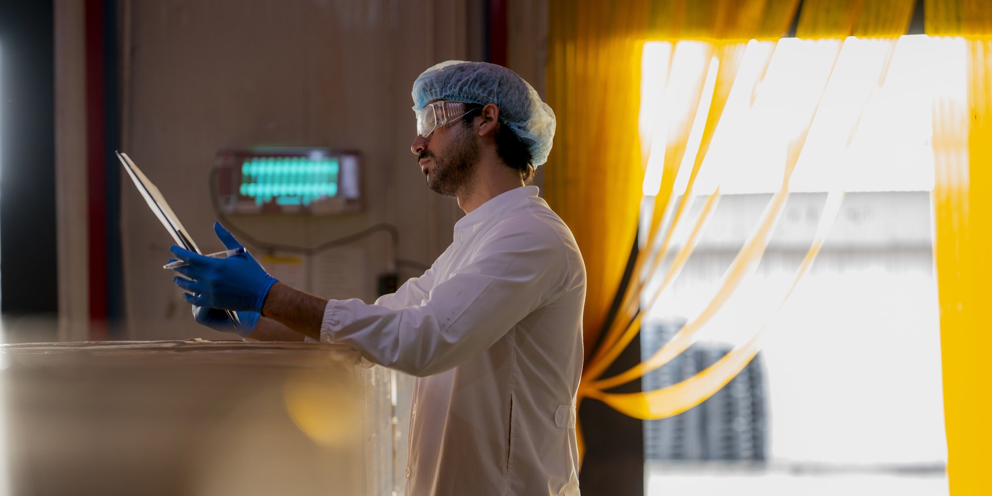 worker-inspecting-processed-seafood-in-organized-c-2026-01-09-11-38-49-utc2